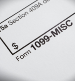Colleyville business owner collecting W-9 forms from contractors for 1099 filing
